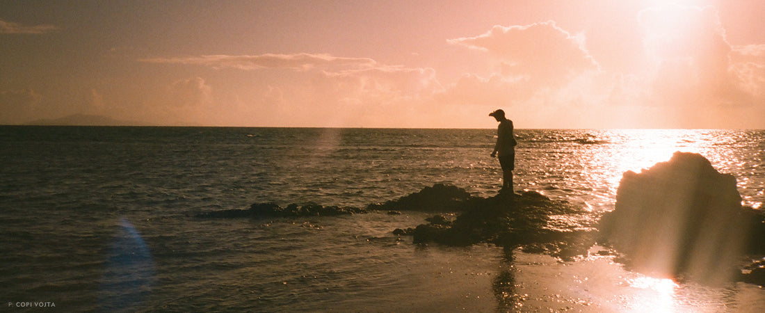 On a DIY trip to Puerto Rico, The Flyfish Journal Editor Jason Rolfe scans for permit. Or bonefish. Or tarpon. Anything to cast at really. Photo: Copi Vojta