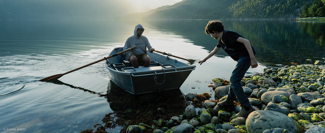 Jeff and Oly Dean Hickman board their dinghy for an evening exploration of Kimsquit Bay, BC. Photo: Chase White