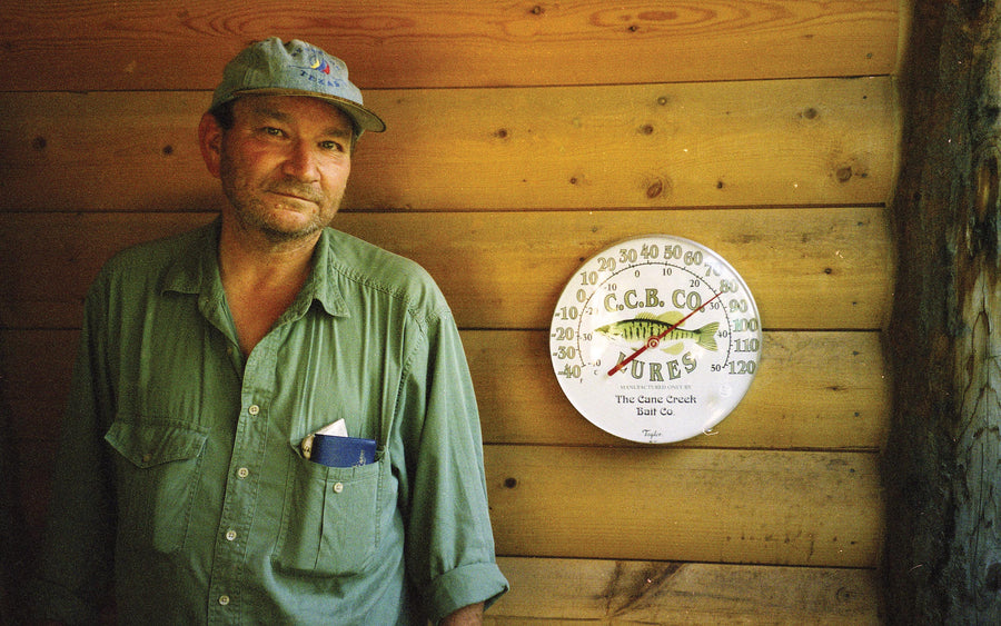 Howard Waldrop stands outside his apartment at the Oso General Store in Oso, WA, 2002. Photo: David E. Myers