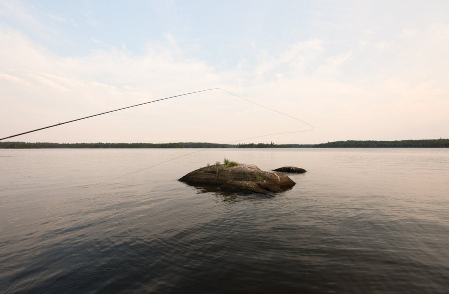 Firelight near dusk made for pleasant evenings on Ontario’s Lake of the Woods. Photo: Copi Vojta