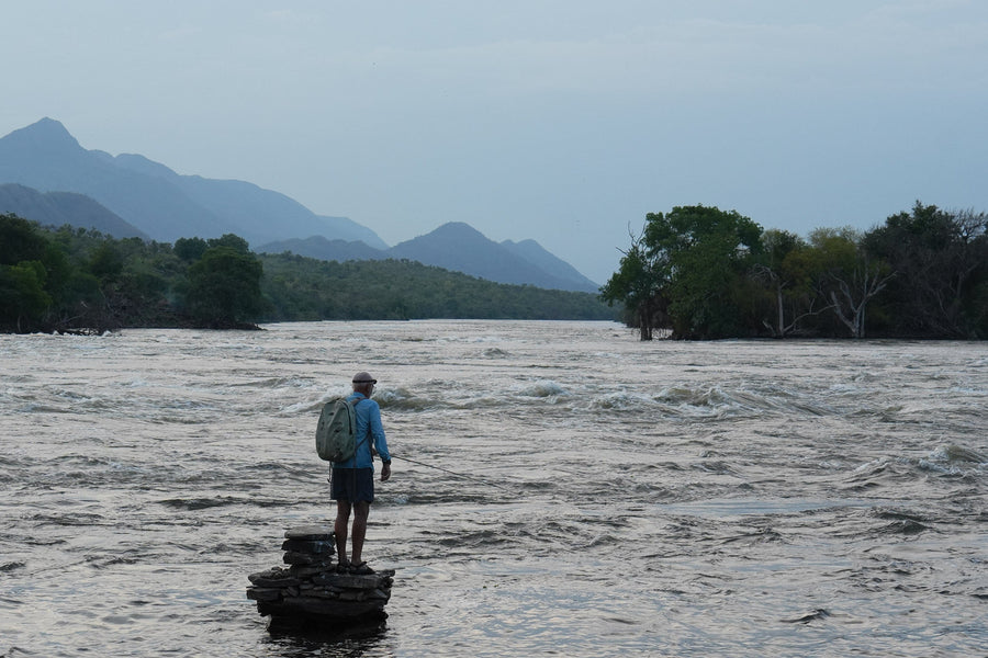 As dusk descends on the Nile River in South Sudan, Mike Fay contemplates the pool from a local fisherman’s casting platform.