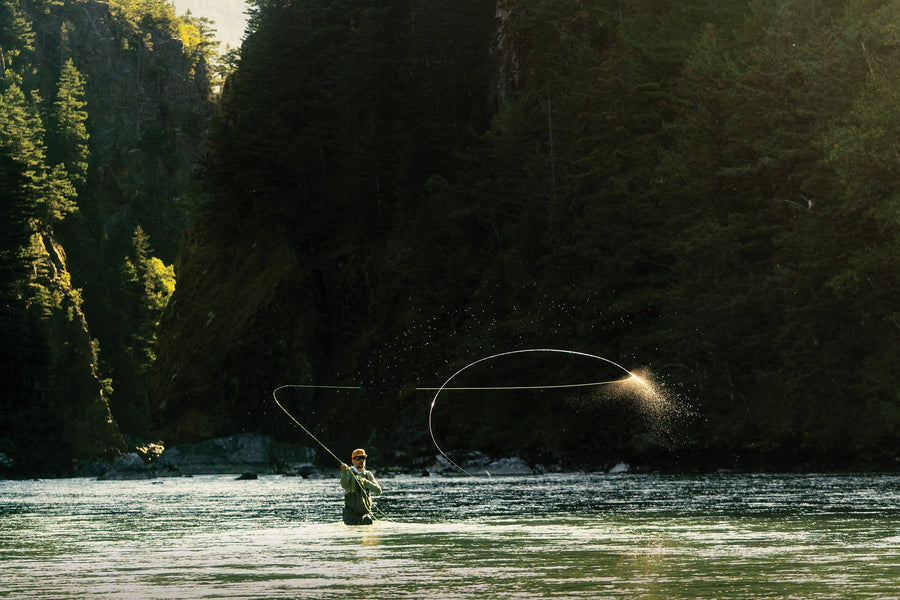 Nicholas Blixt snake rolls his spey cast at the canyon mouth in British Columbia. Photo: Chase White