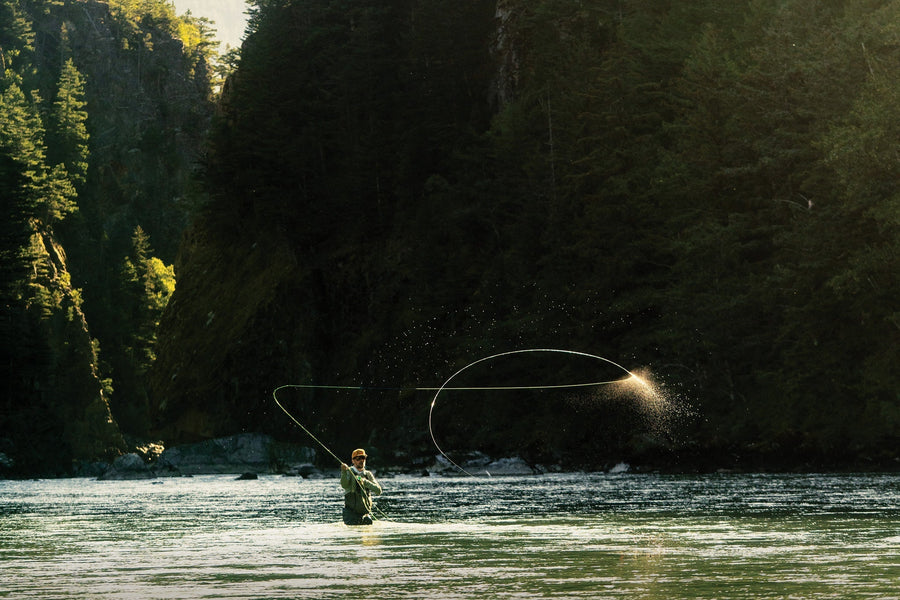 Nicholas Blixt snake rolls his spey cast at the canyon mouth in British Columbia. Photo: Chase White