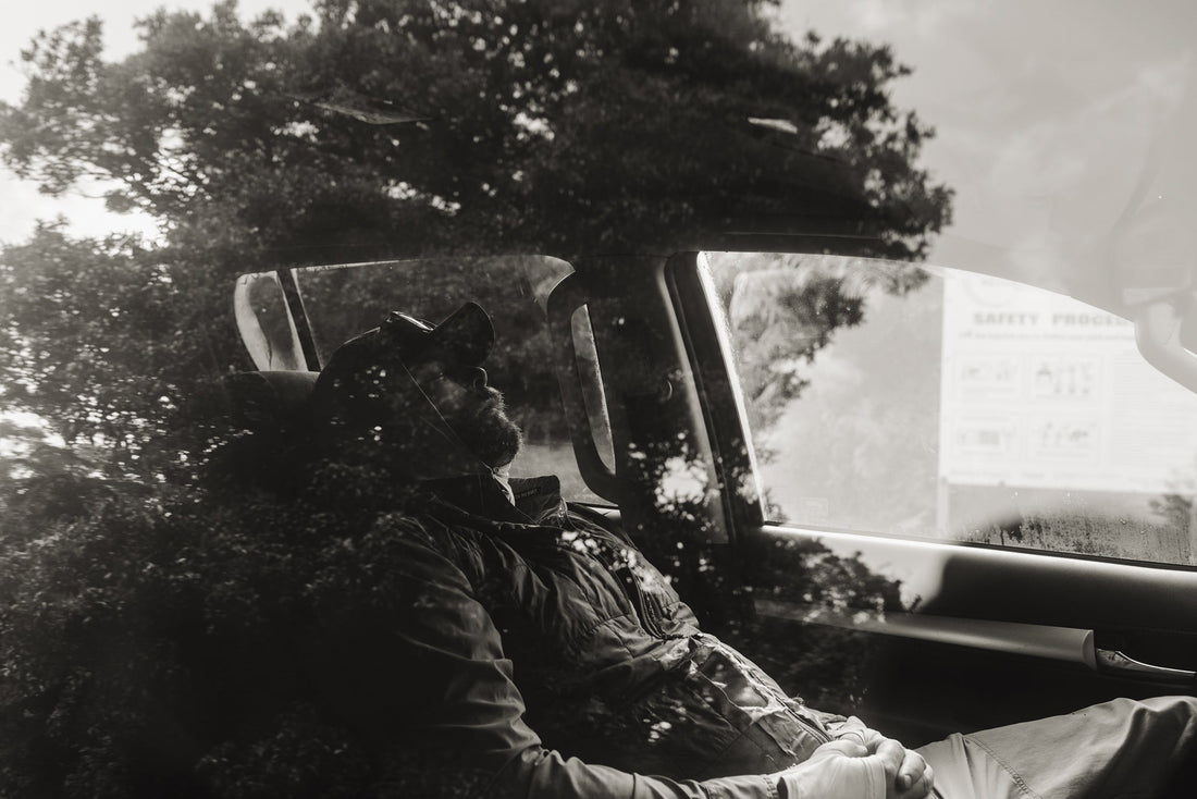 “Ben West—aka Big Country—enjoys a riverside nap in the Hilux after a 2 a.m. wake-up followed by a cancelled helicopter pickup.