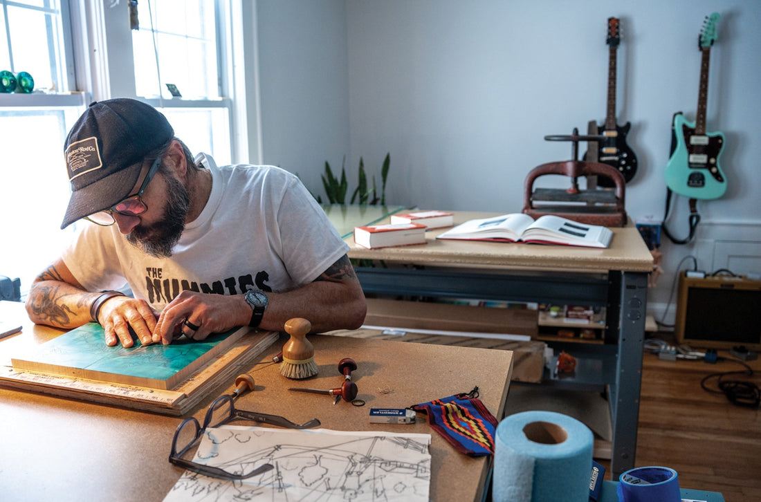 At home in the studio, smaller prints, including wood engravings, can be carved, inked and pressed on one of two small presses.