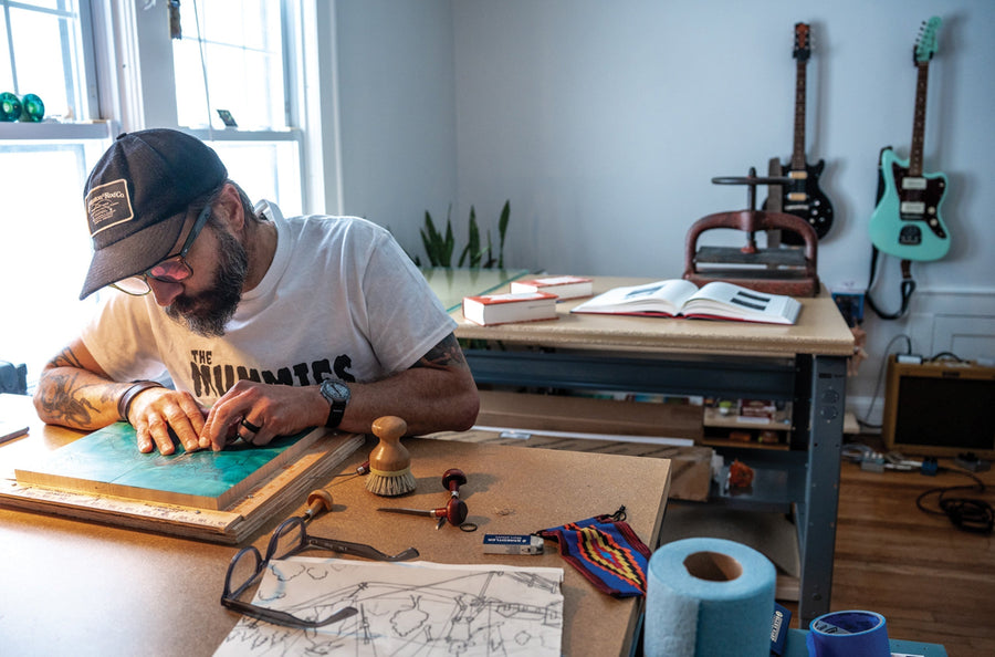 At home in the studio, smaller prints, including wood engravings, can be carved, inked and pressed on one of two small presses.
