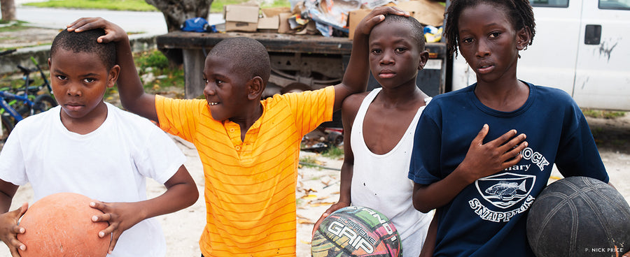 Kids playing basketball on Andros Island in the Bahamas