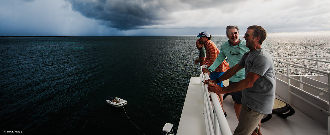 David Broadus, Jim Schmitz, Willie Evans and Greg Blume enjoy a post-fishing moment on a liveaboard smack dab in the heart of Jardines de la Reina.