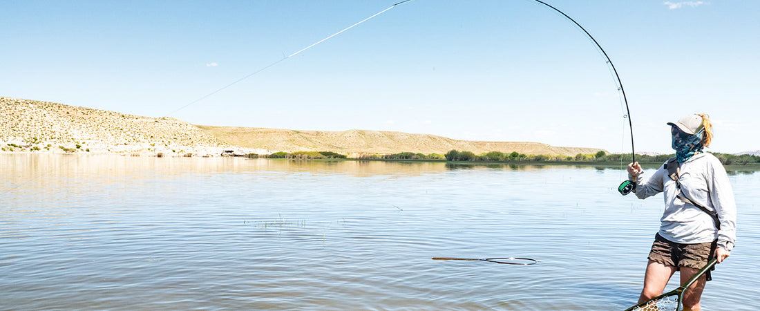 “This fish was too big for the first net Katie Knick tried to land it with. Luckily one of us always carried a net that could fit even the biggest fish this lake had to offer. She was usually the one who needed it the most.” Photo: Nick Basaraba