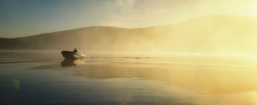 A man flyfishing in Canada's Northwest Territories
